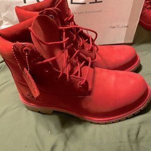 Size 8.5 Red Timberlands! Mint Condition, No Scuffs. BRAND NEW! NEVER BEEN WORN!